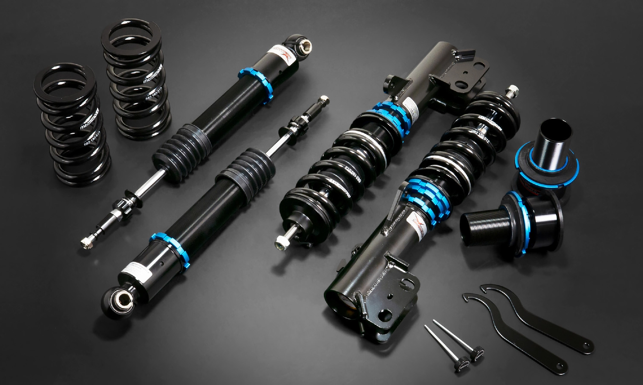 Technician inspecting underbody on lift